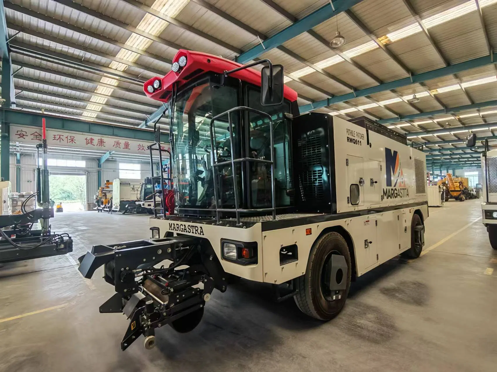 Versatile Pothole Repair System for All Weather Conditions