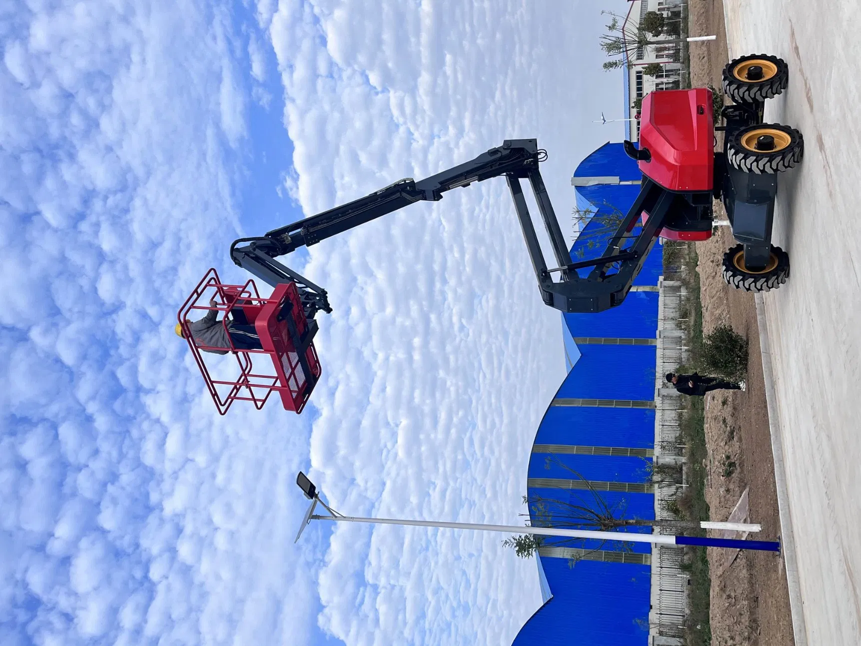 Efficient Articulated Arm Aerial Work Platform for Indoor and Outdoor Use