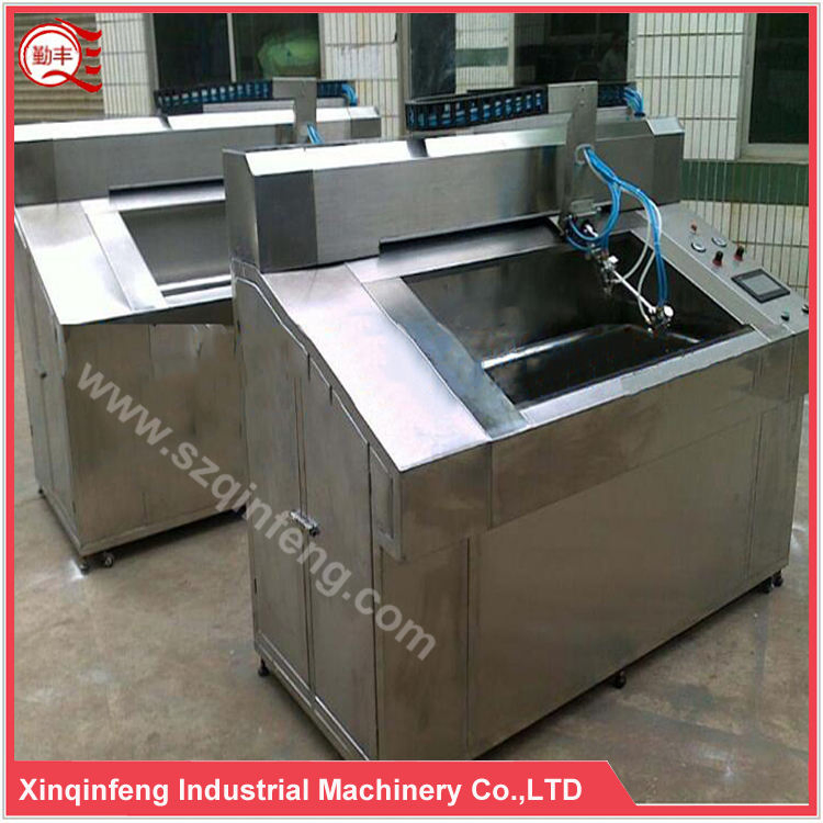 Versatile Automatic Painting System for Eyeglass Frame Production