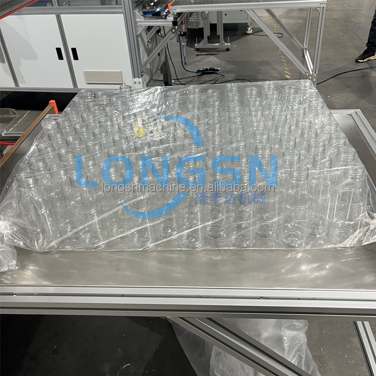 Full Automatic Empty Bottle Bagging Packing Machine View