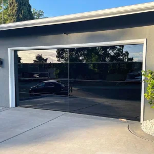 OUNA Slim Frame Glass Garage Door Maximizes Light and View Automatic Tempered Panels for Modern Architectural Homes