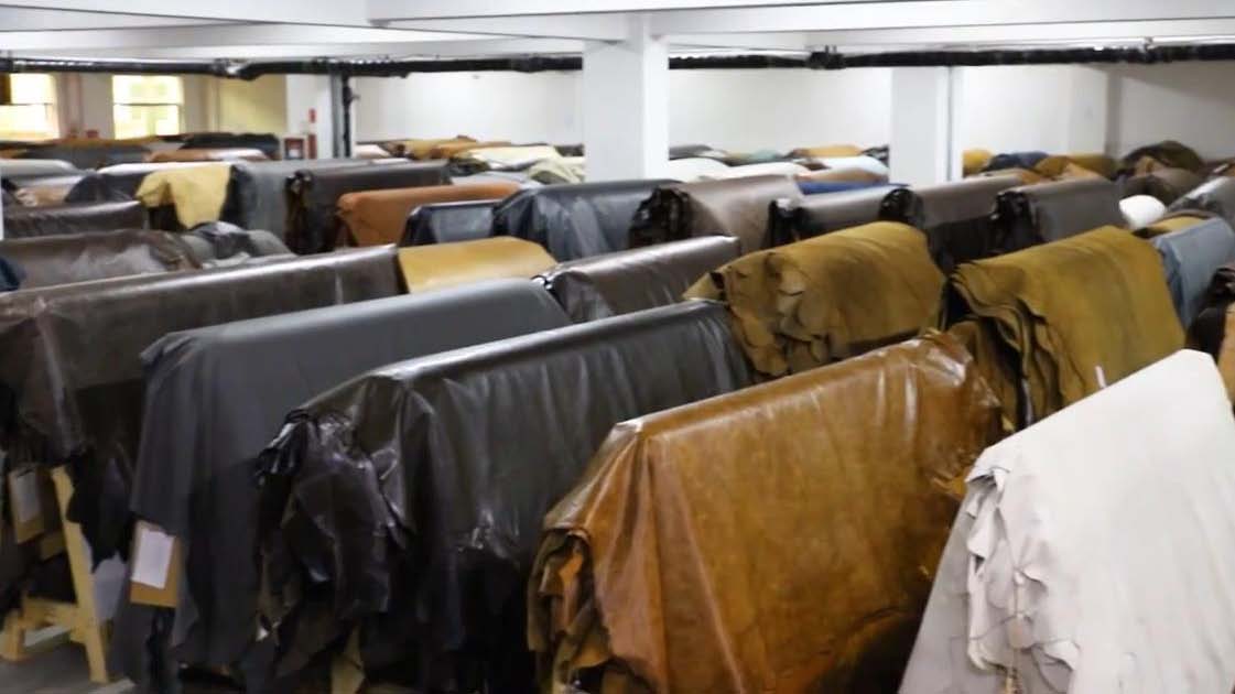 Premium top grain leather rolls stocked in the warehouse