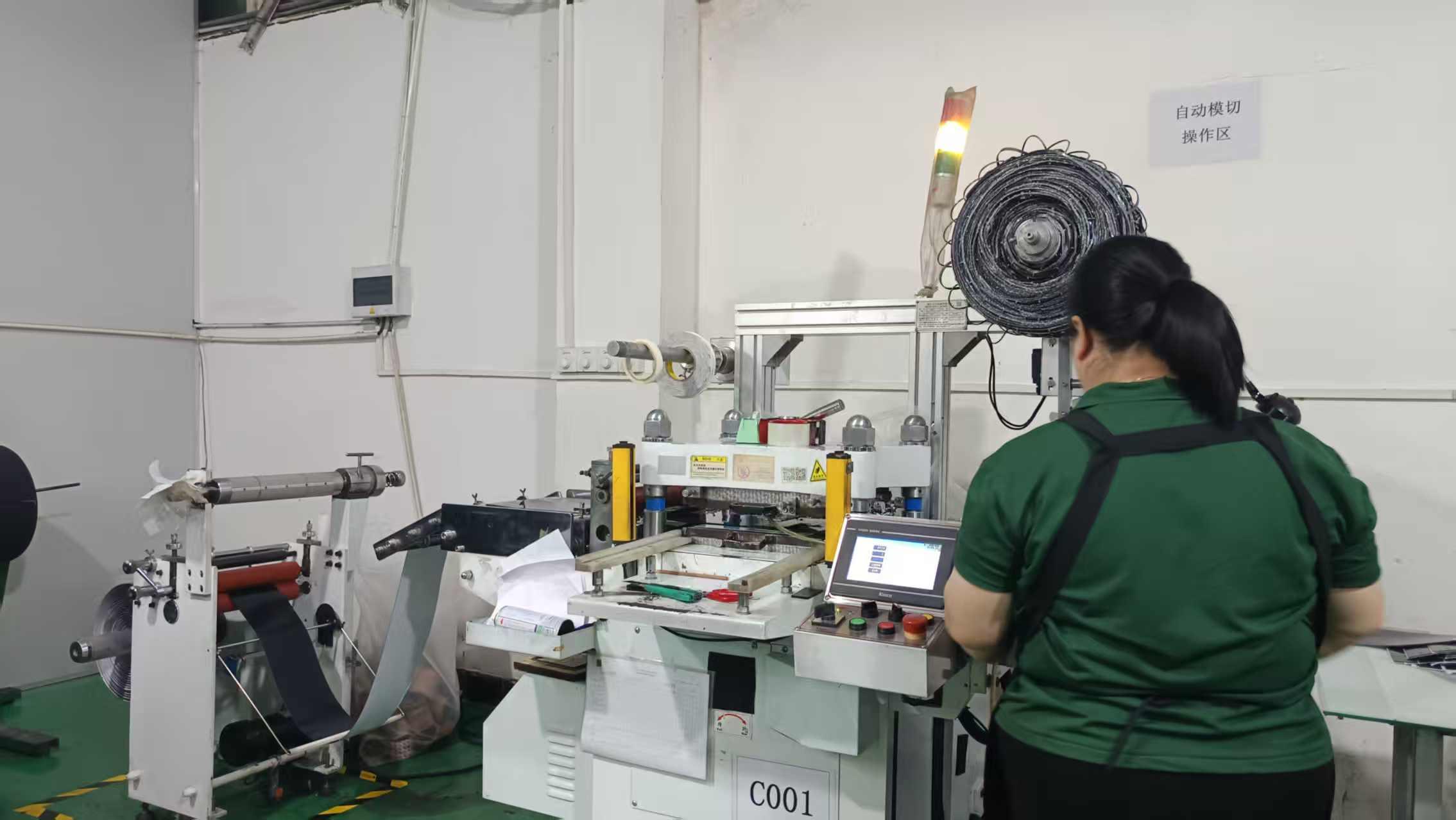 Die-cutting machine for precision automotive components