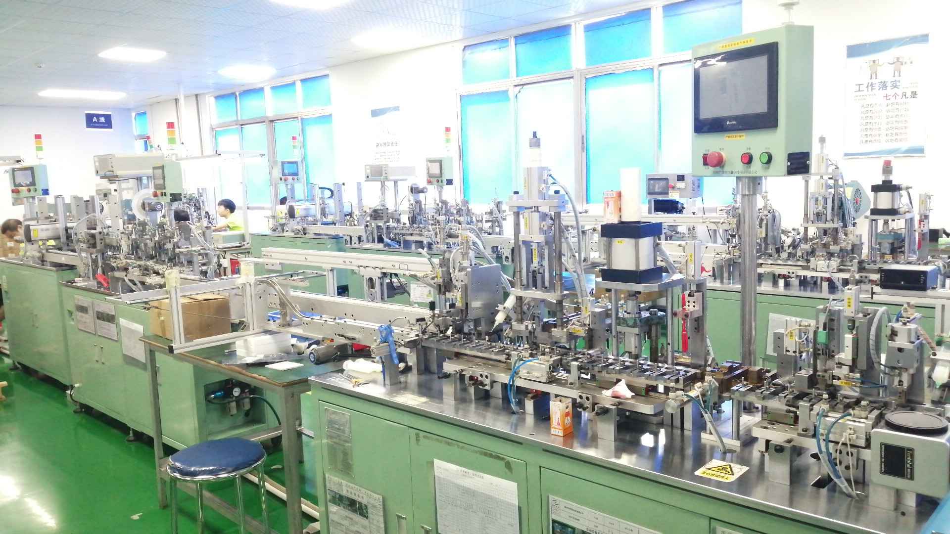 Automatic assembly line for high-volume micro motor manufacturing