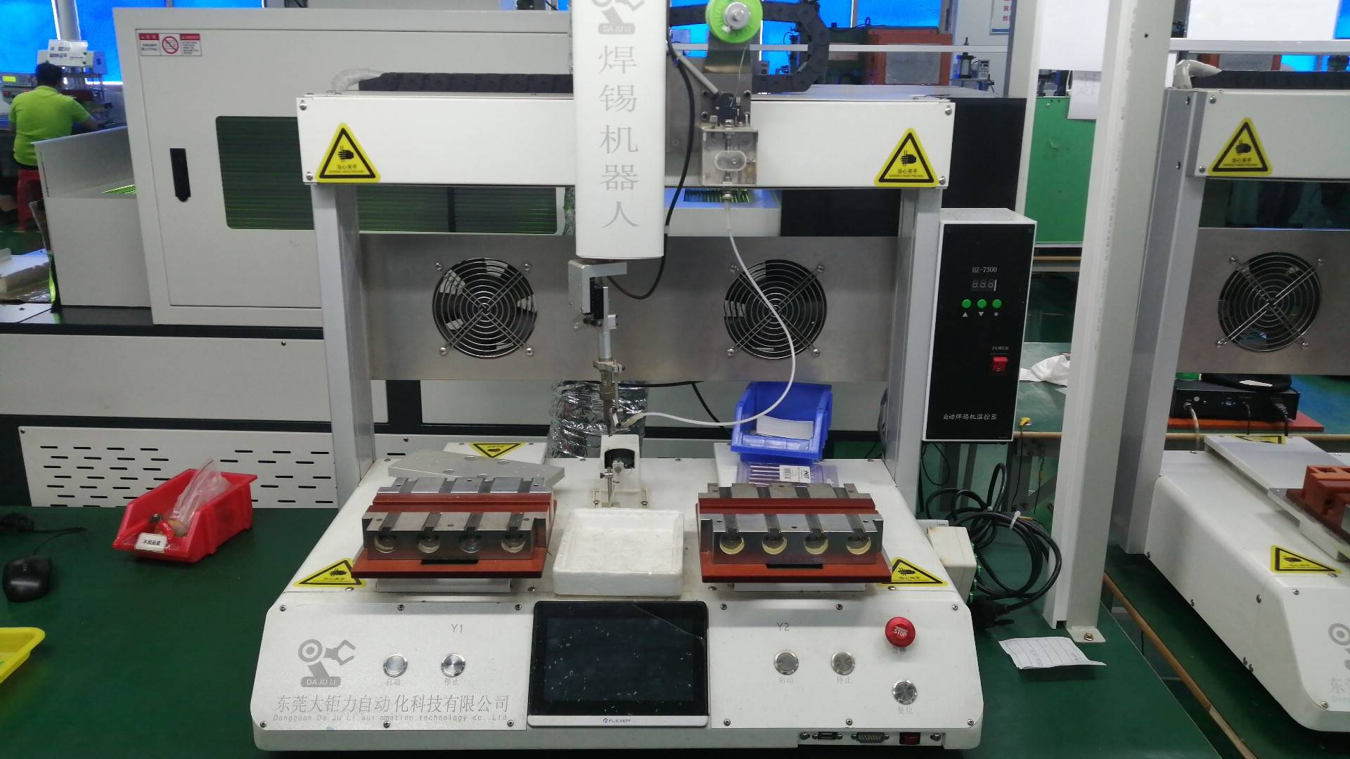 Second automatic soldering machine for high-volume motor production