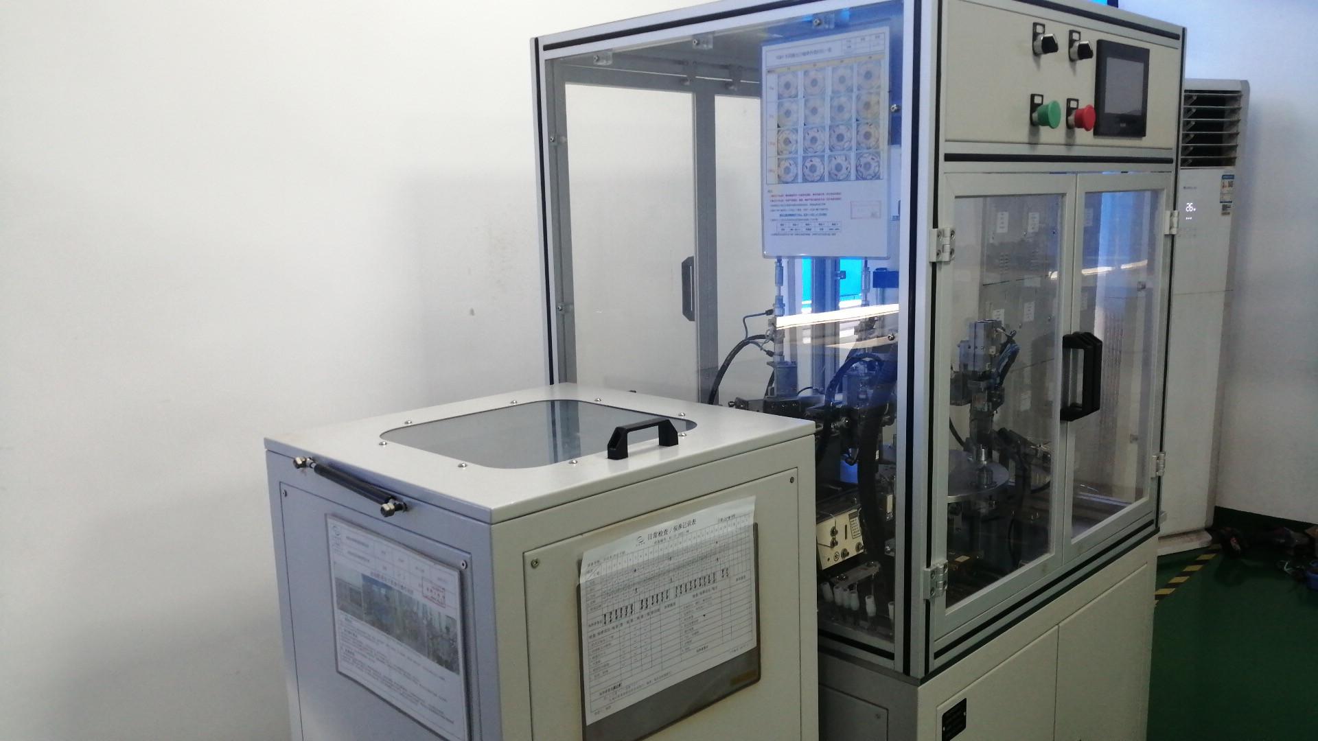 Automatic pressure bearing machine for motor shaft assembly