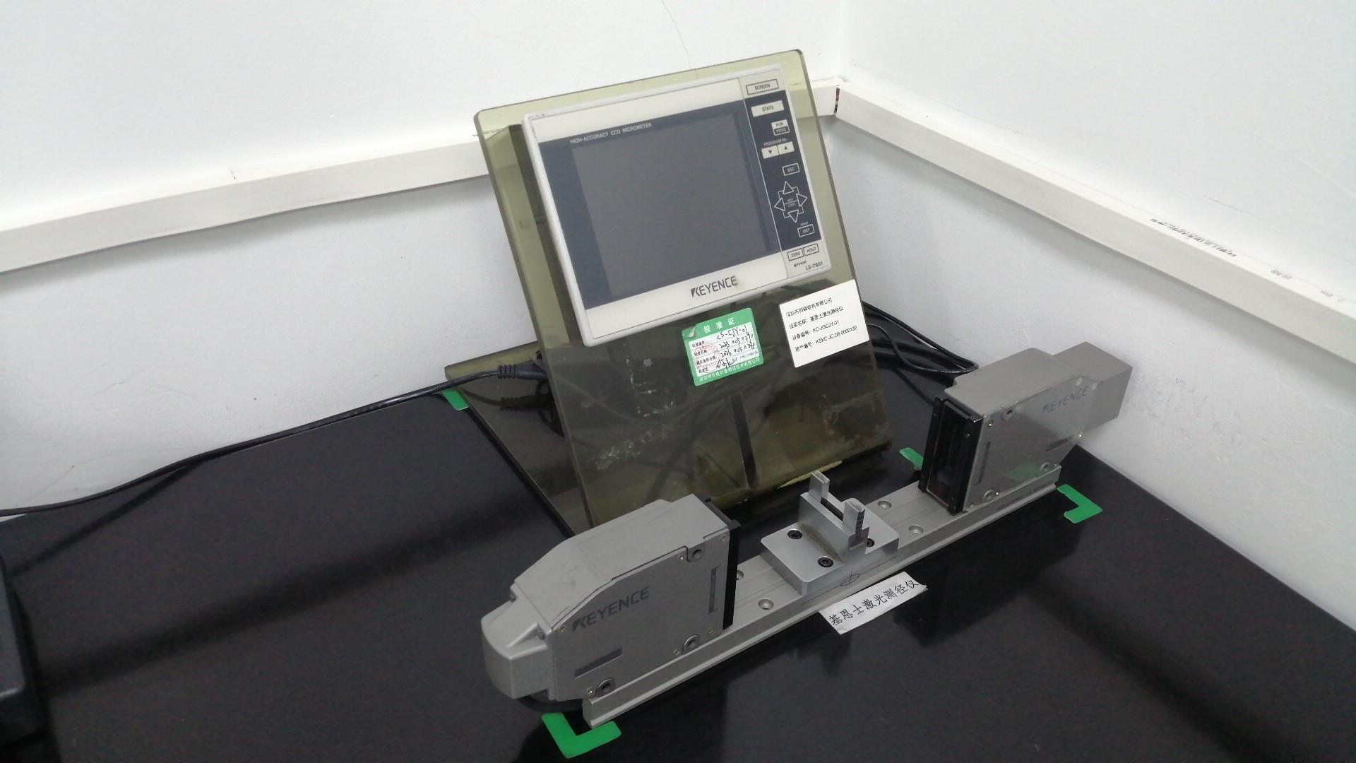 Keyence laser caliper for non-contact precision motor dimension measurement
