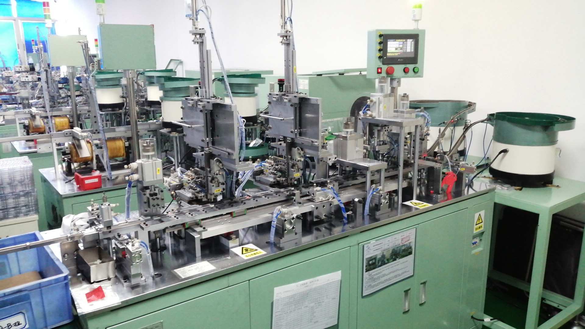 Automatic assembly machine for micro DC motor production at Axon Motor