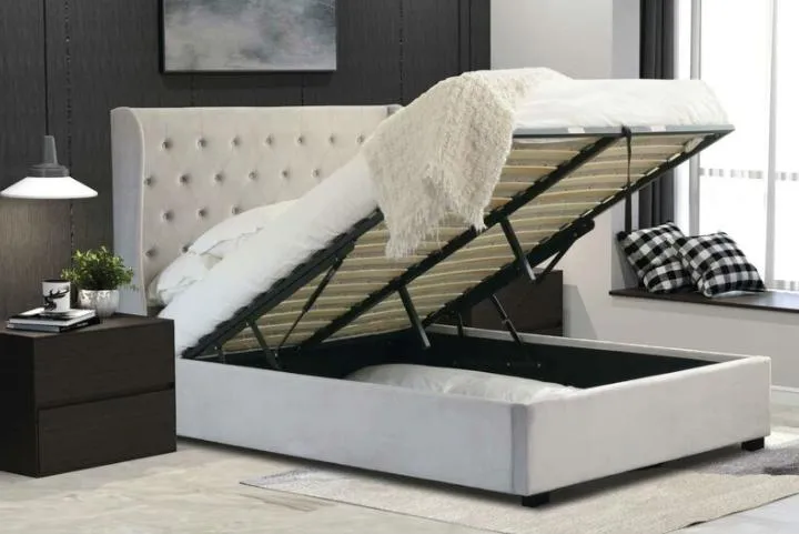 Estructura de cama plataforma tapizada con elevación de gas y cabecera con botones y almacenamiento