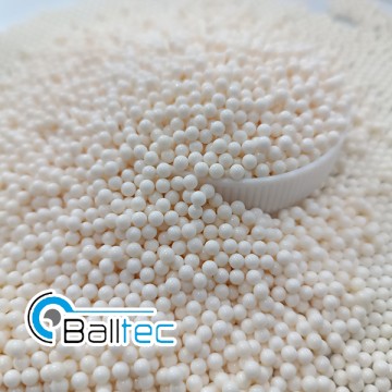 Corrosion resistant high purity alumina grinding spheres