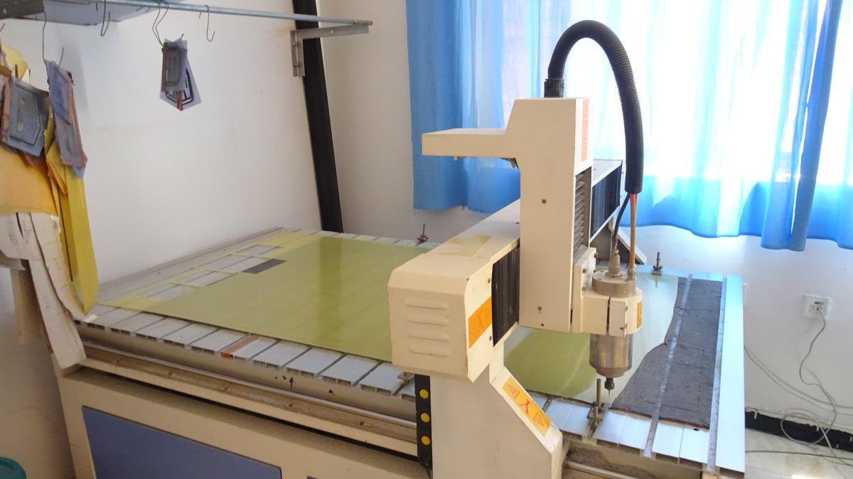 Laser engraving machine for precision fabric and leather detailing