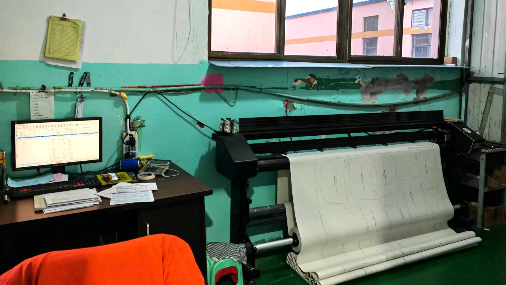 Plotter machine for garment pattern printing and layout