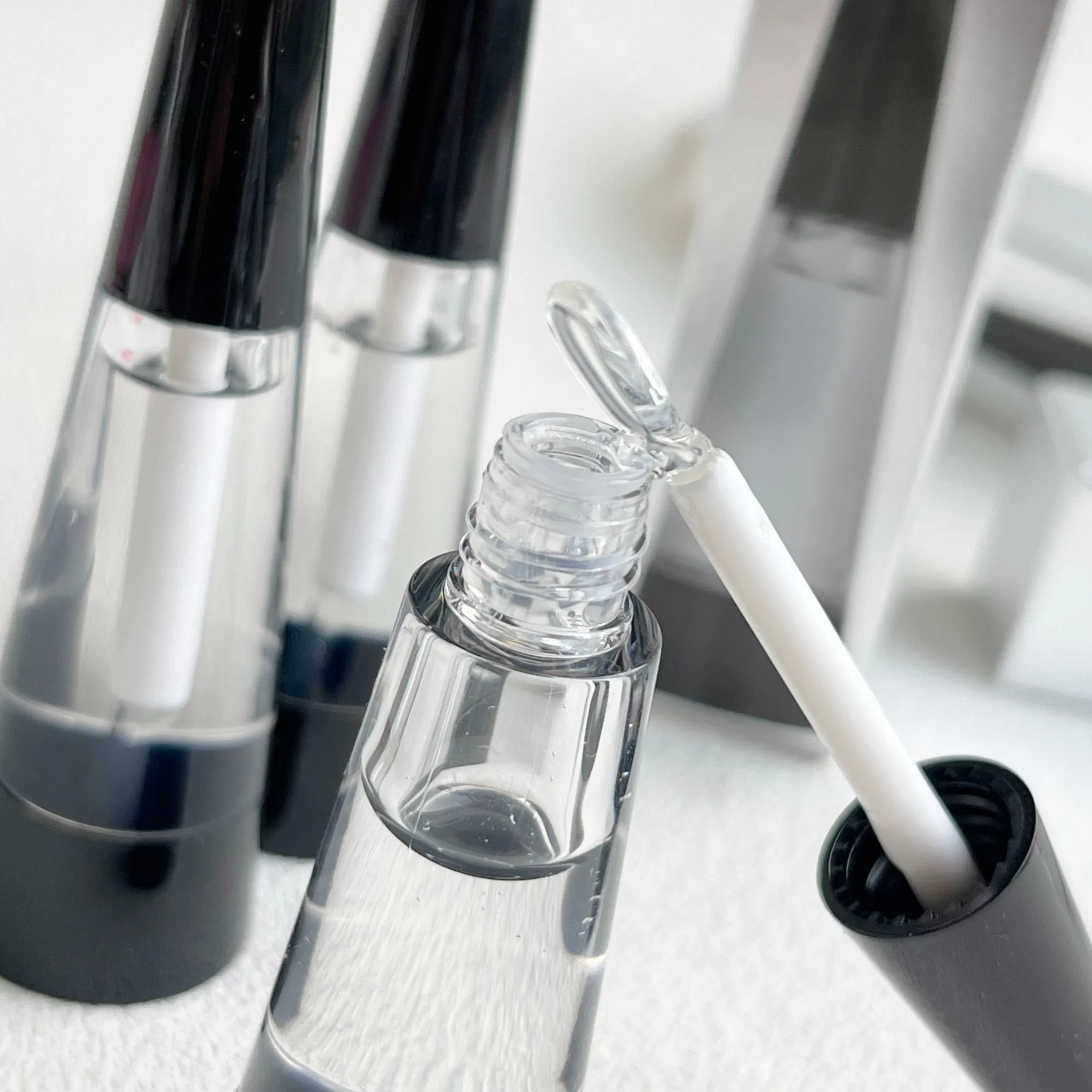 Private Label Vegan Hyaluronic Acid Iridescent Finish Long-Lasting Strong Sting Lip Plumper Gloss with ODM Service