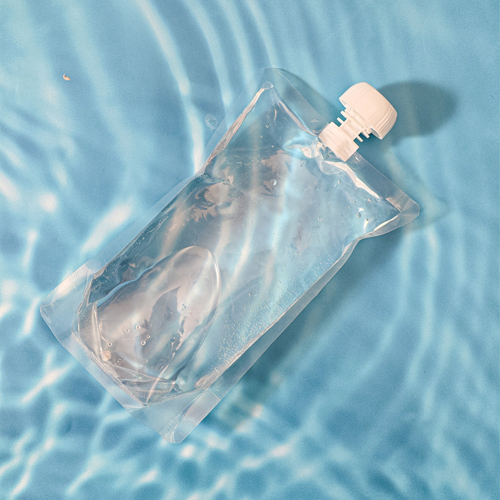 Durable Food Grade Self-Standing Clear PET Beverage Packaging Bag Spout Top for Juice Mineral Water Beer Custom Logo Gravure