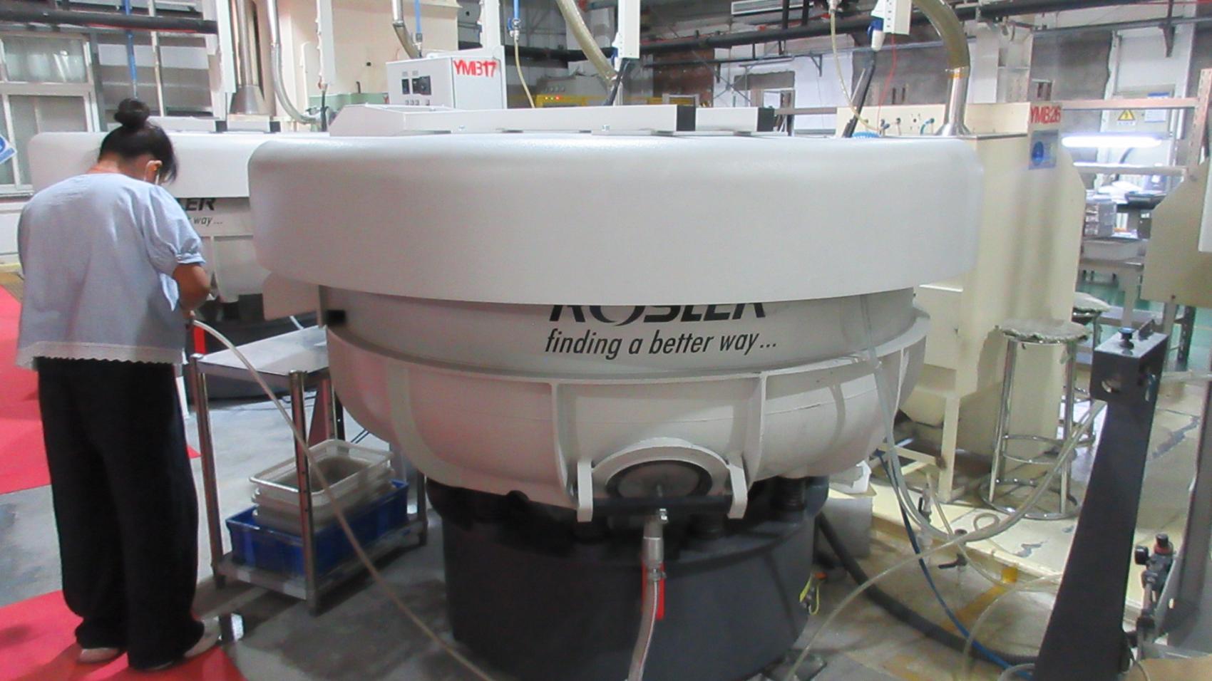 R&D engineers machining high-precision molds for custom medical components