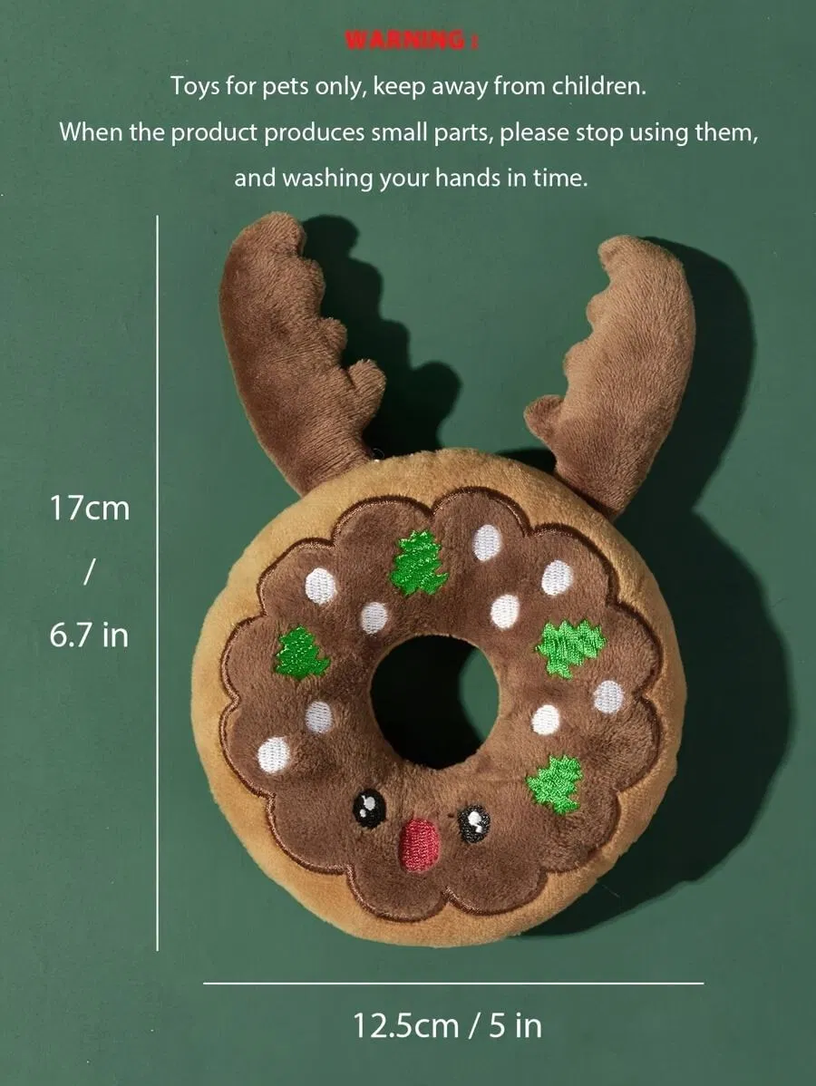 Detalle del juguete de peluche navideño para perro