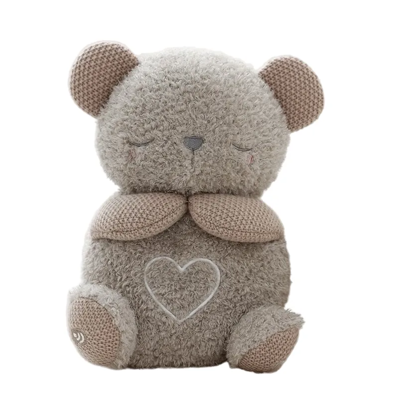 Juguete de oso de peluche que respira para calmar y arrullar a los recién nacidos