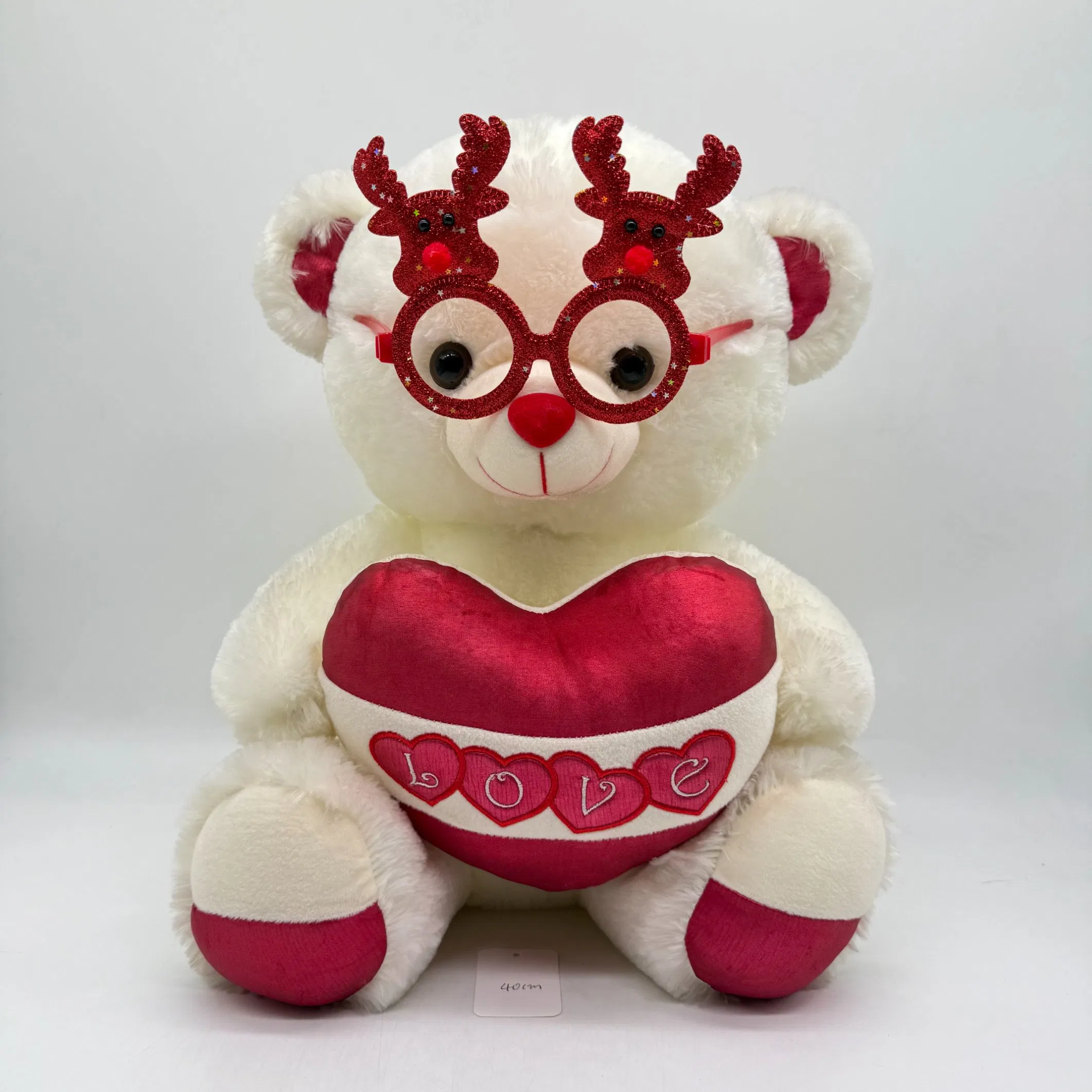 Osito de peluche beige personalizado con almohada en forma de corazón y gafas