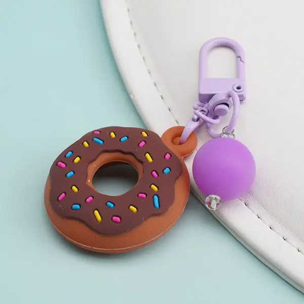 Custom Silicone Pet AirTag Holder with Glow-in-the-Dark Bead – Cute Paw, Donut, Fruit Designs – 42×35mm – Wholesale