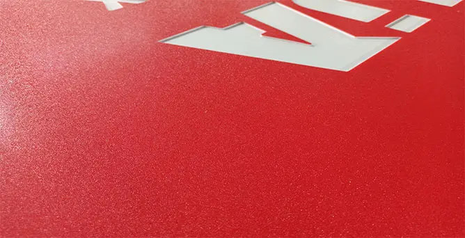 Carved HDPE sheet revealing inner layer