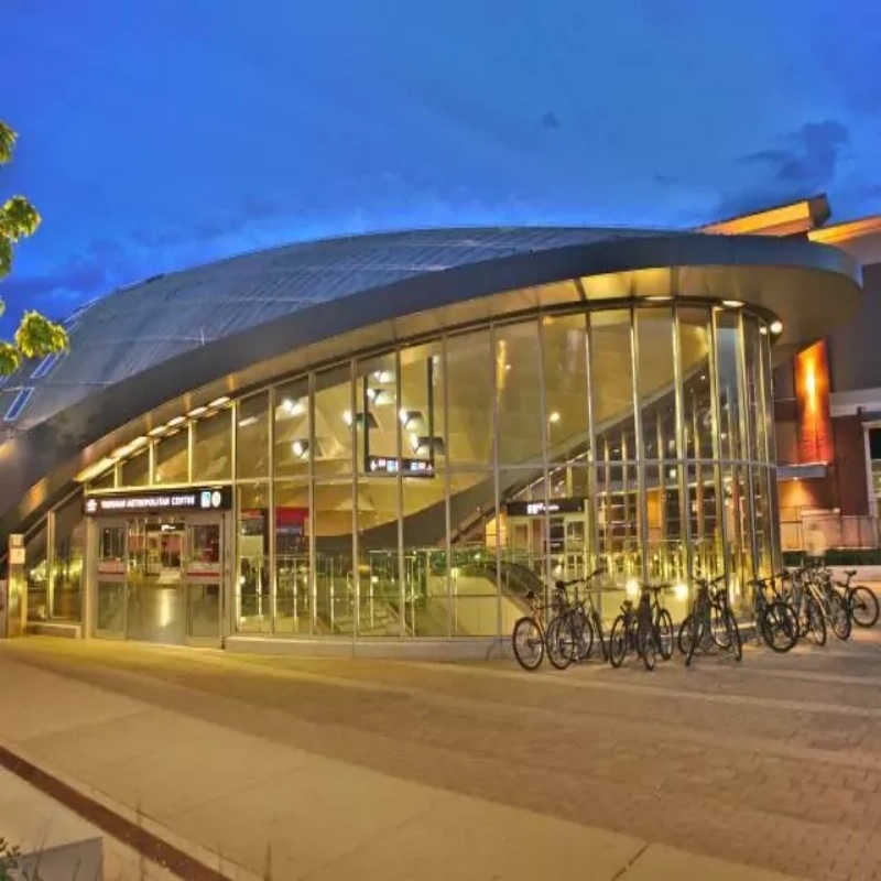 High-Speed Railway Metro Gas Station Curved Roof Canopy Design Prefabricated Light Steel Structure Pipe Truss Shed Building