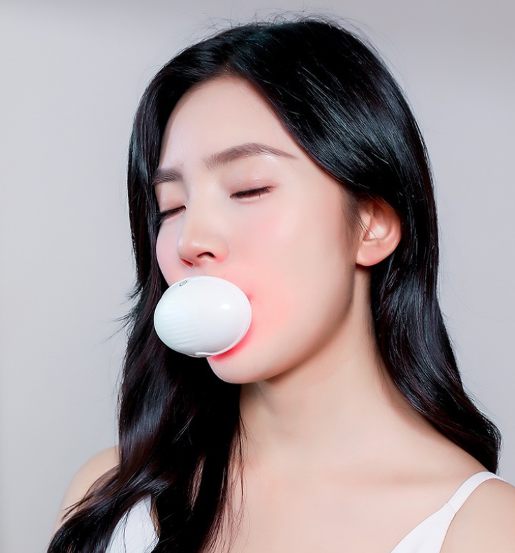 Portable lip treatment device with 24 infrared light collagen for plumping, fuller, and firmer lips.