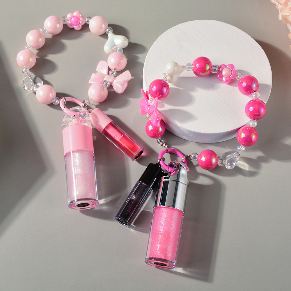 Wholesale Vegan Moisturizing Hydrating Lip Gloss Private Label Bracelet Lip Oil Fruit Flavor Liquid Form Color-Changing Effect