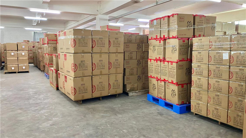 Final packed wax and liquid cosmetics products ready for global export from Jiangsu Jenae Beauty