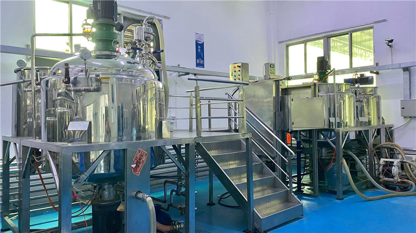 Emulsifying process for wax-based cosmetic formulations at Jenae Beauty manufacturing lab