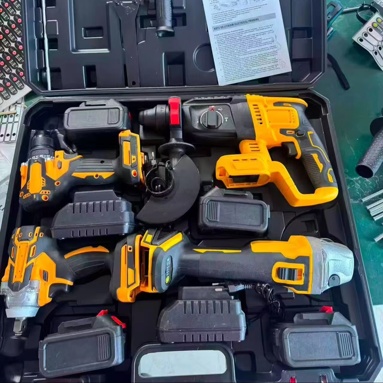 Battery Powered Cordless Plastic Box Combo Kit 4 In 1 Brushless Impact Wrench Angle Grinder Hammer Drill Power Tool Set