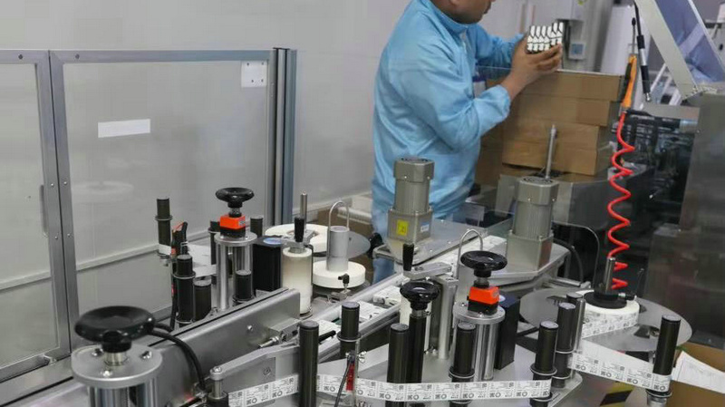 Contact lens finished product packaging inspection and boxing
