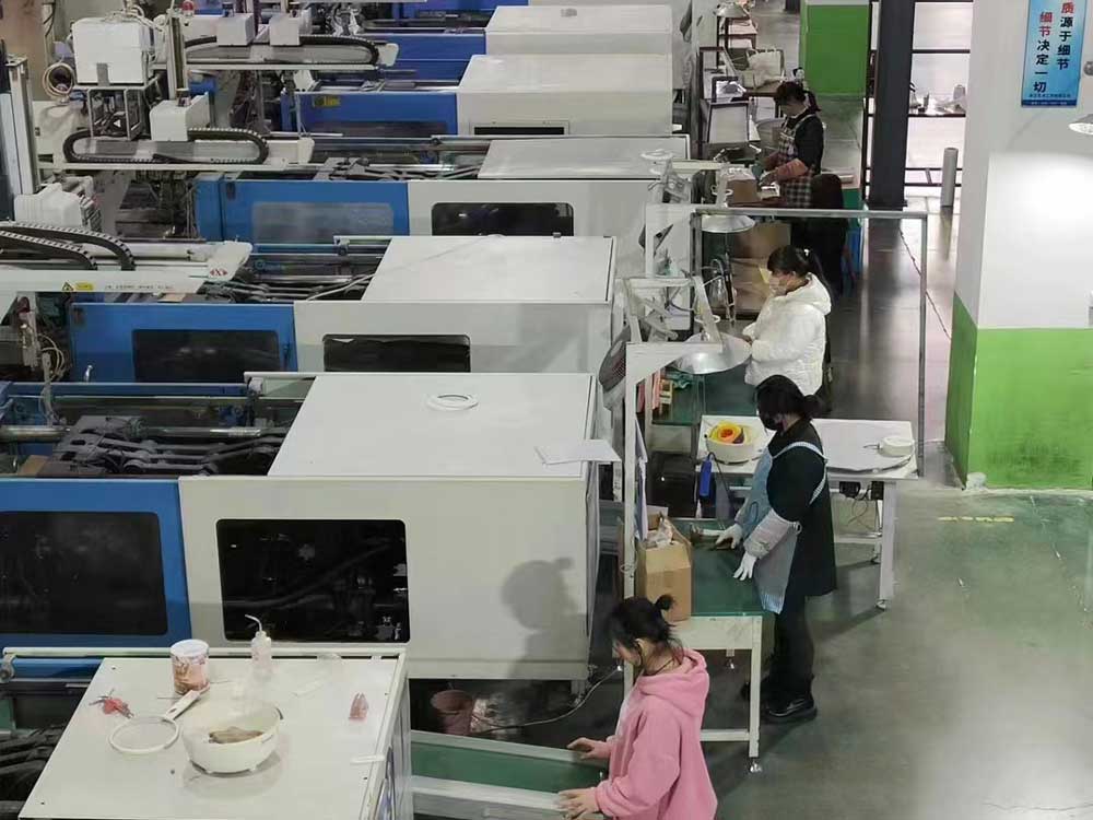 Blossom assembly line with skilled workers producing premium kitchen tools