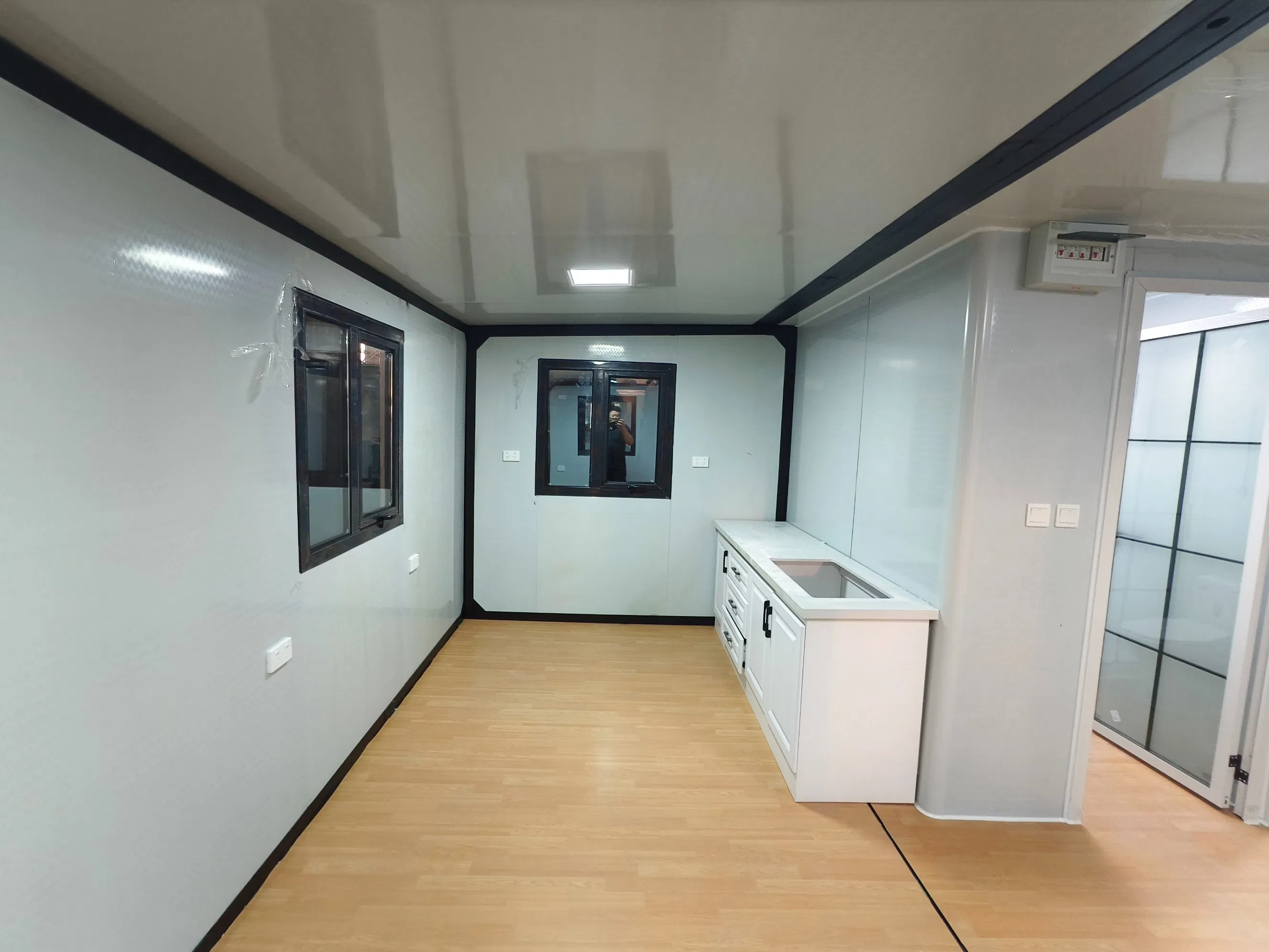 Casa Modular Portátil de Luxo Popular da China 20FT/30FT/40FT como Casa de Família Pequena ou Cabana de Férias com Sala de Estar e Quarto Personalizados