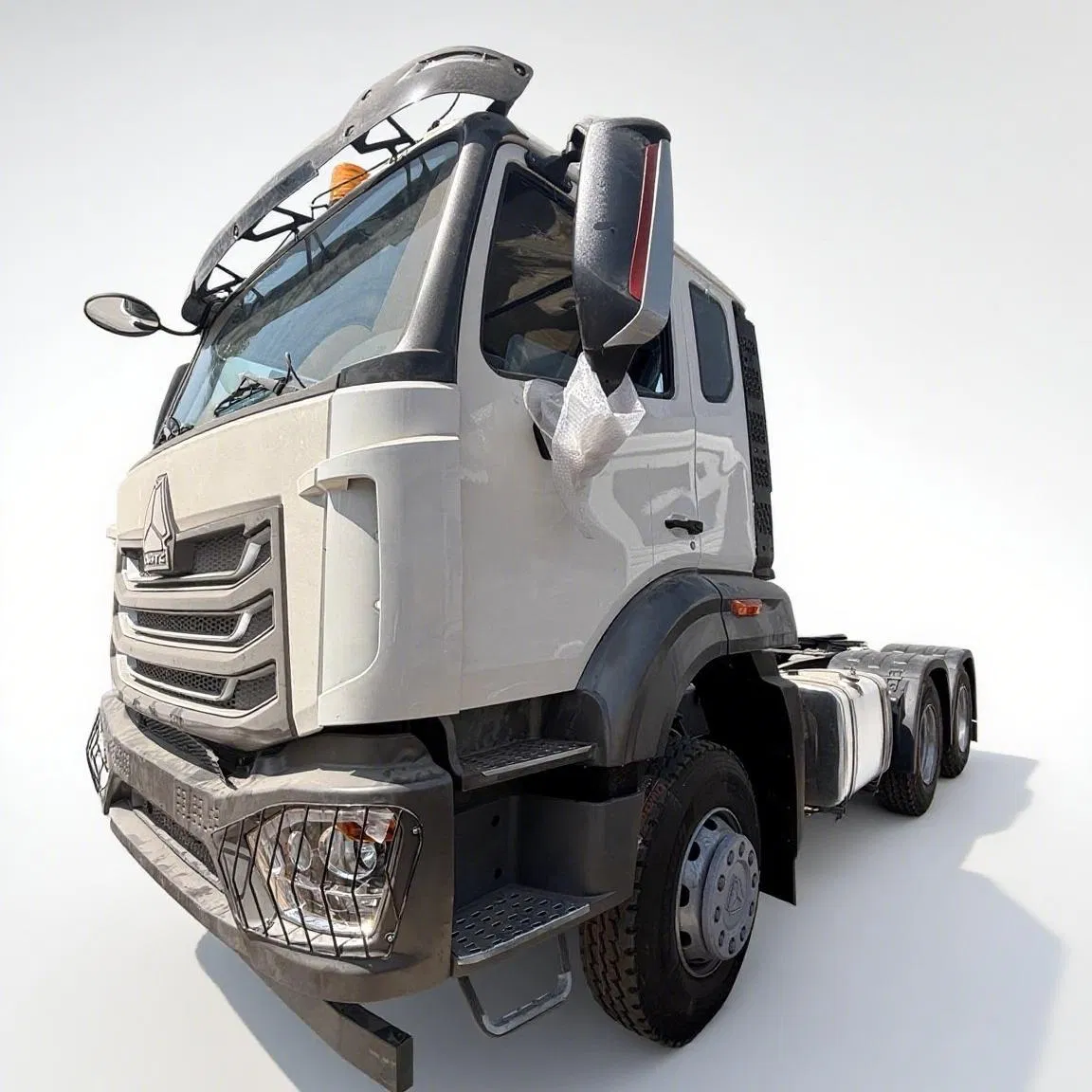 Sinotruk HOWO Nx 6X4 371HP Tractor High Performance Heavy Duty Truck 4X4 50t/80t Tipper/Dumper Heavy Duty Truck Logistics Distribution Truck Rhd