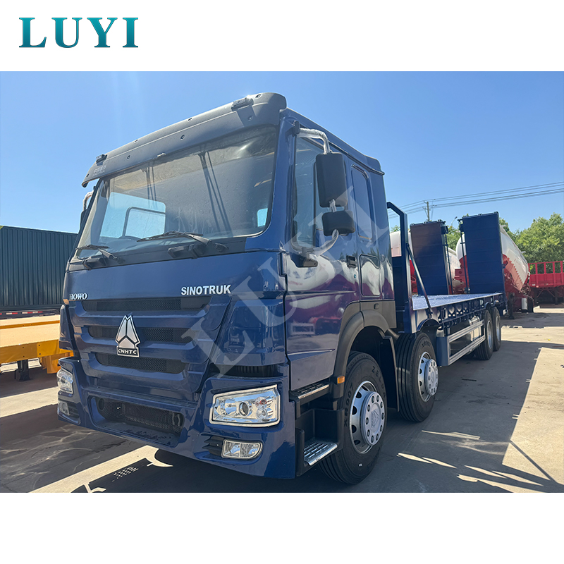 Heavy Duty 40ton 35ton HOWO Flatbed Truck 8X4 Cargo Truck Heavy Duty Excavator Transport Used Truck