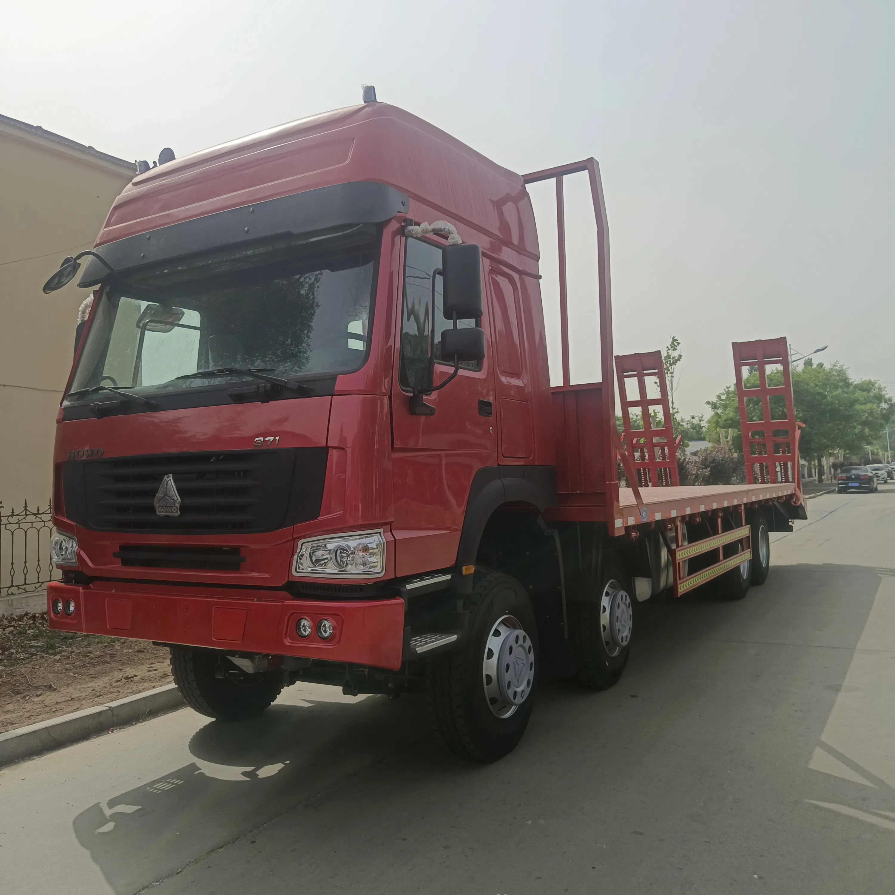 Multi-Function 8X4 Sinotruk HOWO 371HP Flatbed Truck Container Transporter Heavy Machinery Transport HOWO Truck