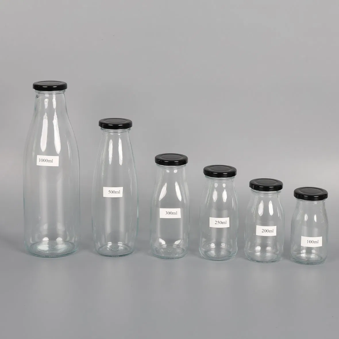 Wholesale High Quality Empty 100ml 250ml 500ml 1 Liter Beverage Milk Juice Glass Bottles with Lid