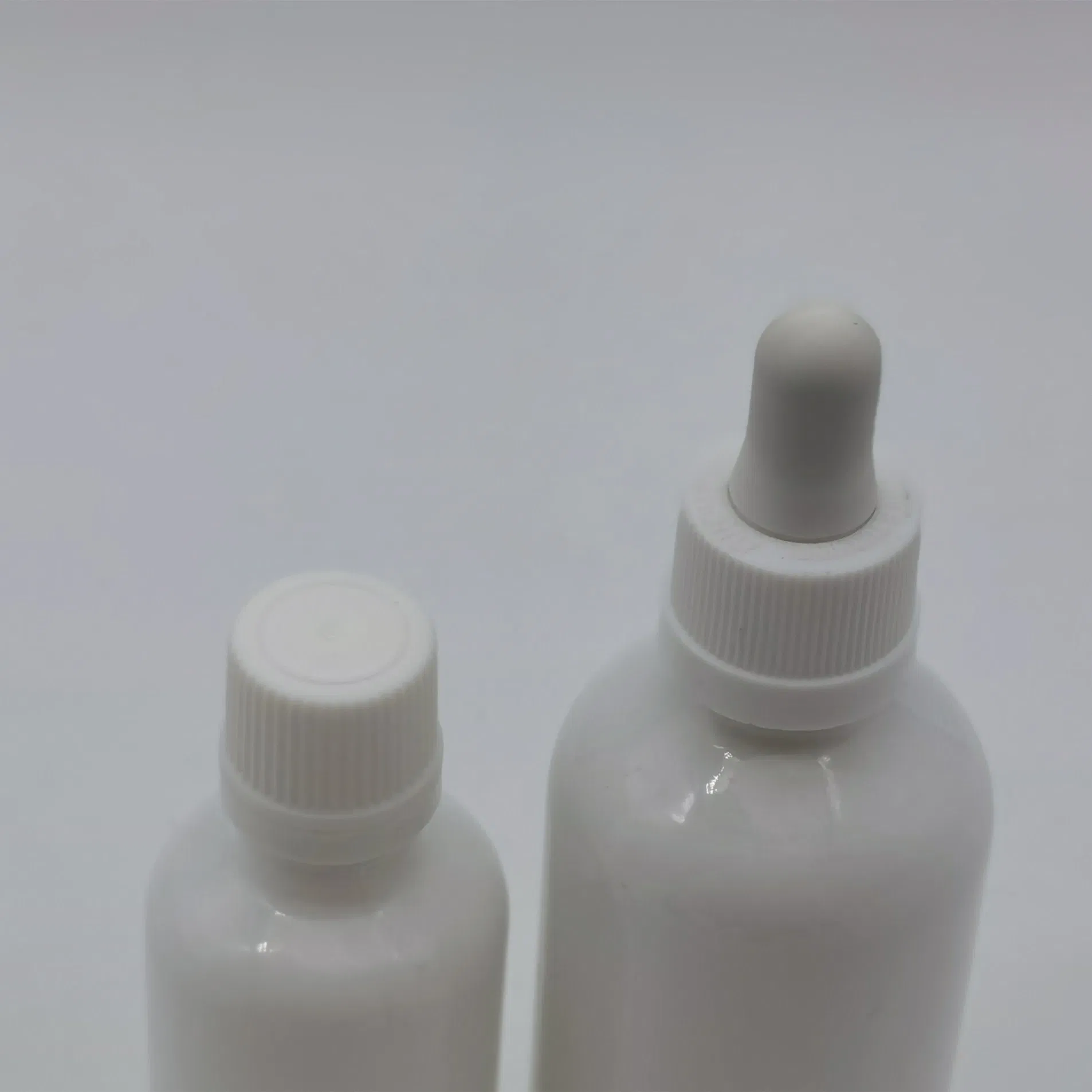 Hot Selling Spot Luxury Empty Serum Oil White Transparent Green Blue Glossy Glass Dropper Bottle with Pipette Gold Screw Lid 1oz 10ml 30ml 50ml 100ml