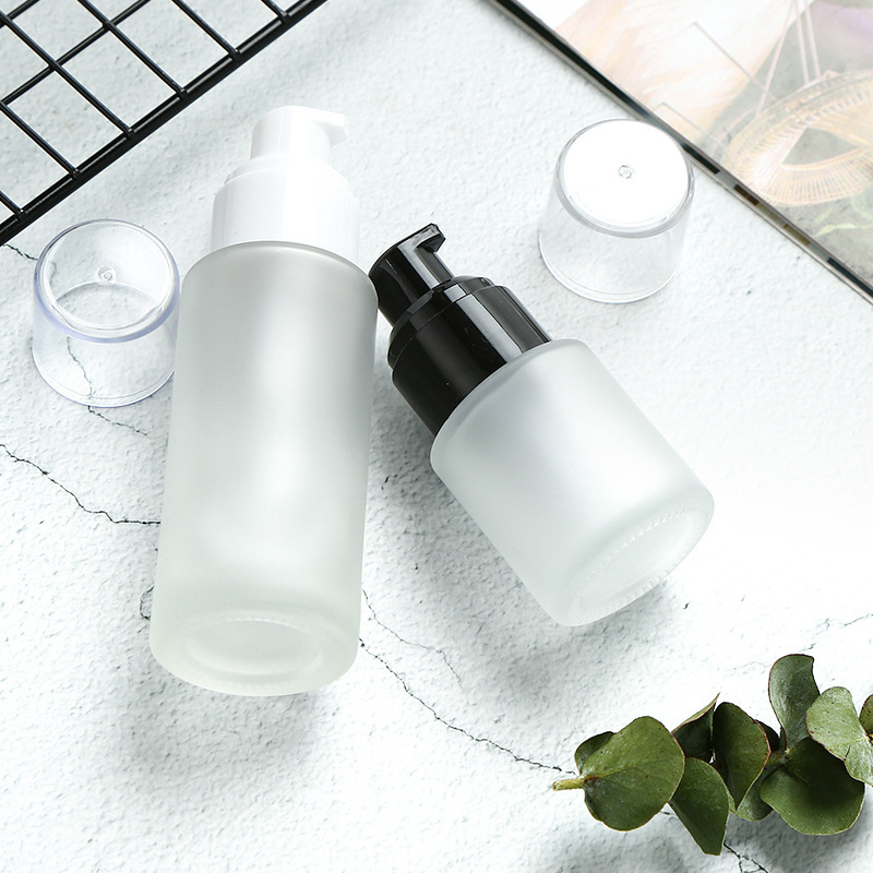 30ml 50ml Round Cylinder Glass Lotion Bottle Liquid Foundation Bottle with Pump and Cover