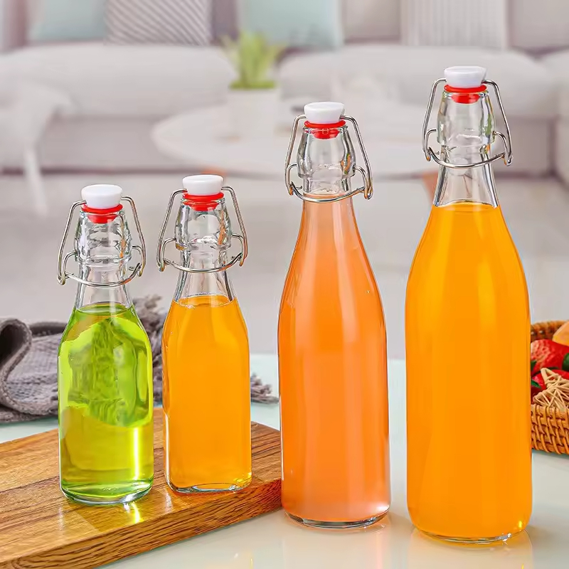 250ml 500ml 1000ml Wholesale Round Clear Kombucha Cold Brew Beverage Drink Bottle Swing Top Glass Juice Bottle