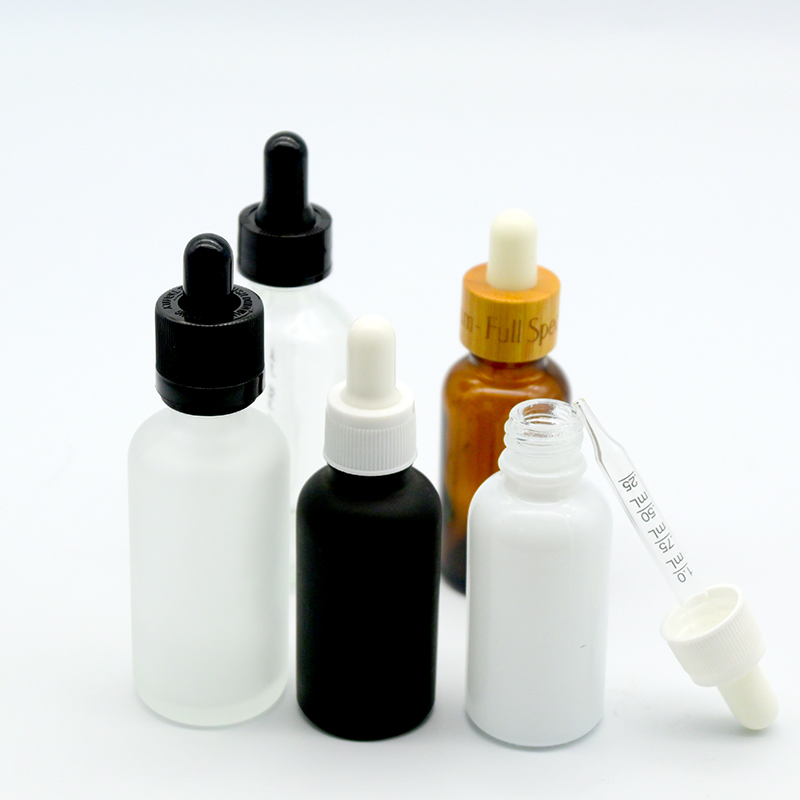 Essential Oil Bottle 5ml 10ml 15ml 20ml 30ml 50ml 100ml Frosted Black White Glass Bottle with Calibrated Glass Pipette Empty Custom Logo in Stock