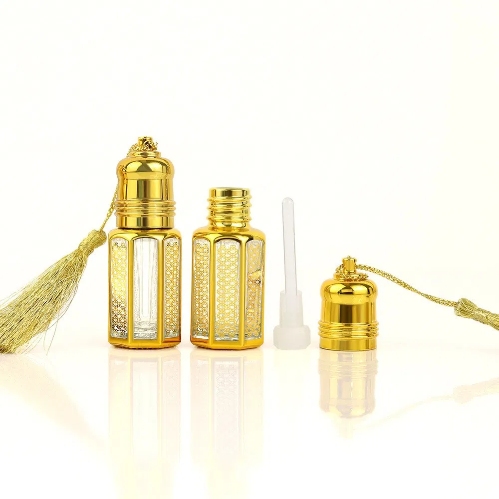 Guangdong Fragrance Middle East Dubai Mini 3ml 6ml 12ml Golden Empty Atomizer Spray Roll on Cosmetic Bottle Essential Oil Arabic Custom Perfume Glass Bottle