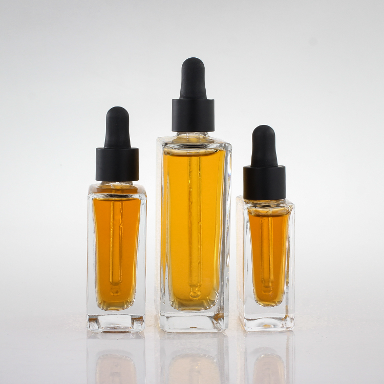 High-End Square Clear Glass Pipette Bottles Essential Oil Rectangle Glass Dropper Bottles with Pipette Black Cap
