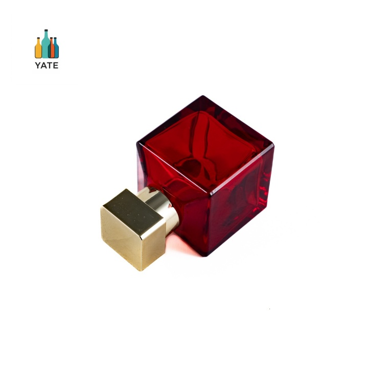 Cube Shape Crimp Neck Gold Caps Glass Perfume Bottle in 70ml Customized Blue