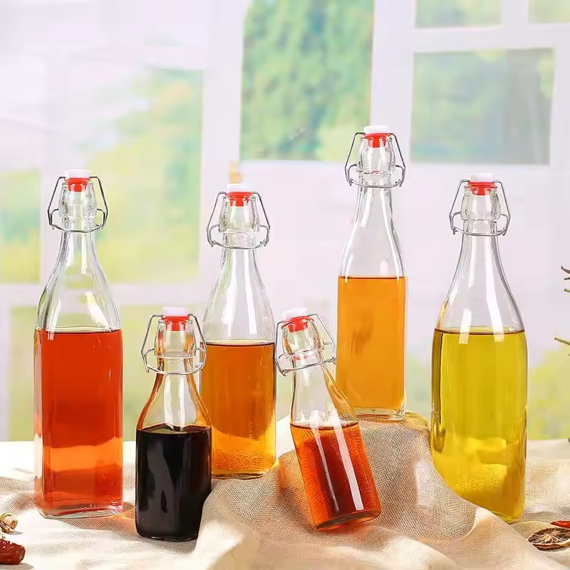 250ml 500ml 1000ml Wholesale Round Clear Kombucha Cold Brew Beverage Drink Bottle Swing Top Glass Juice Bottle