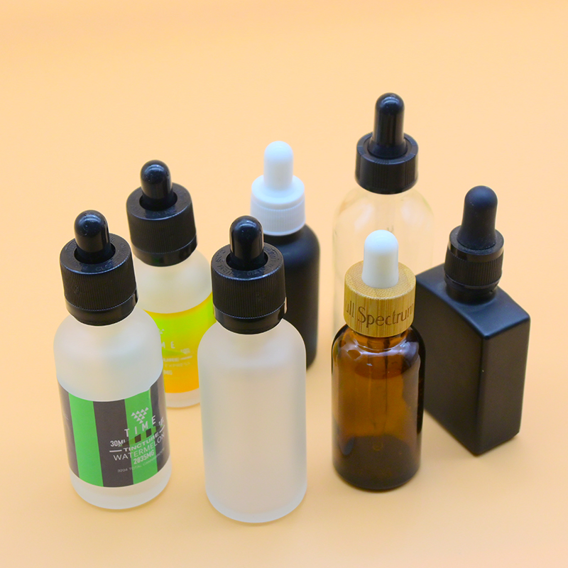 Essential Oil Bottle 5ml 10ml 15ml 20ml 30ml 50ml 100ml Frosted Black White Glass Bottle with Calibrated Glass Pipette Empty Custom Logo in Stock