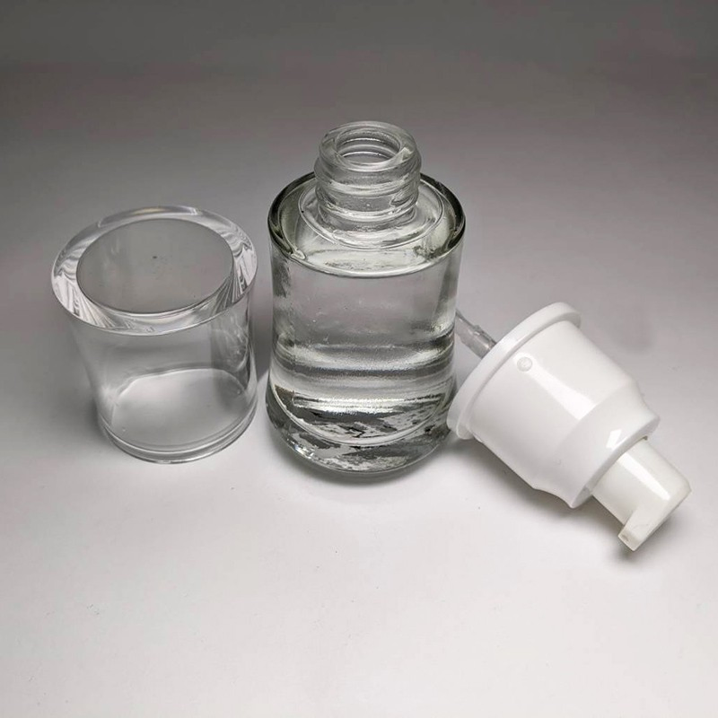 Elegance Skincare 30ml Glass Bottle Plastic Lotion Pump 20/400 Neck Transparent Cap