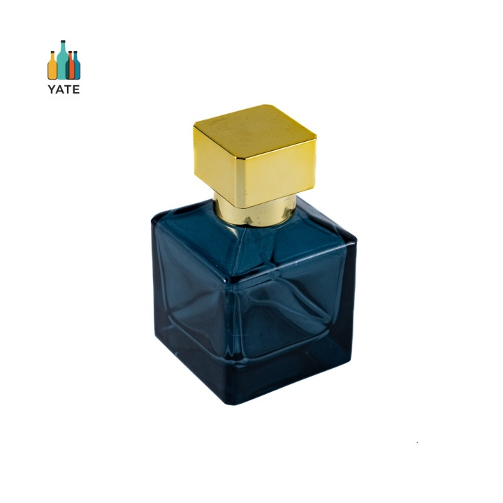 Cube Shape Crimp Neck Gold Caps Glass Perfume Bottle in 70ml Customized Blue