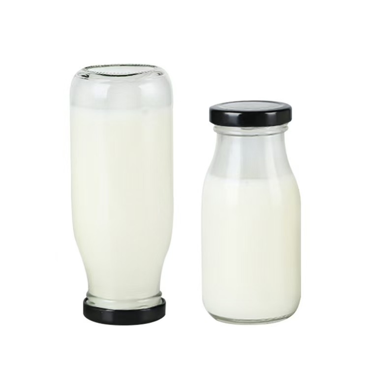High Quality Clear Round Glass Milk Bottle with Metal Screw Cap