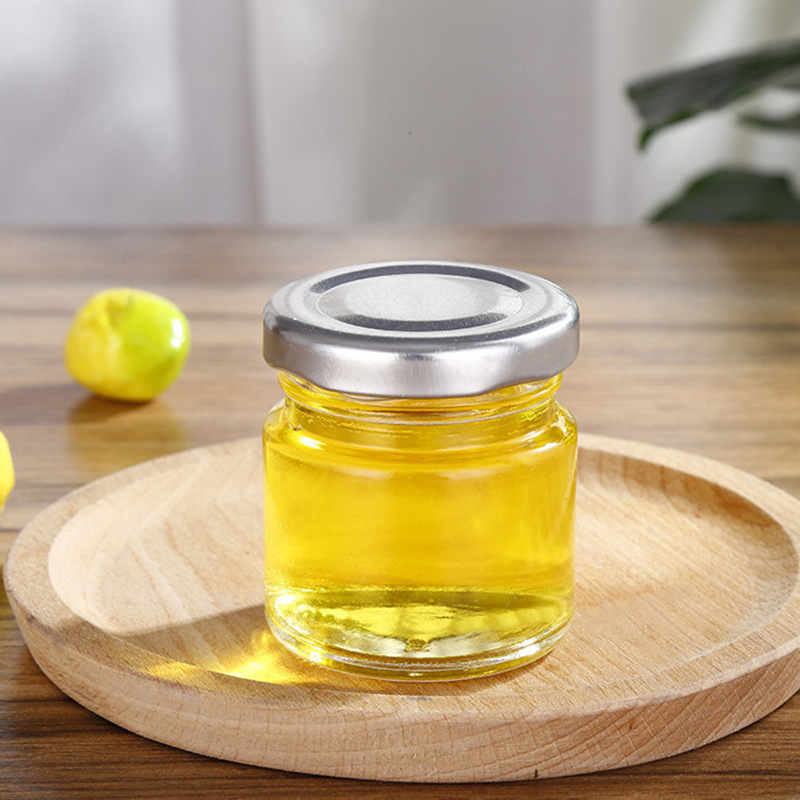 45ml 100ml 240ml 350ml 500ml 750ml 1000ml Honey Jam Spice Candle Canning Pickle Food Storage Customized Food Grade Empty Clear Round Glass Jar with Metal Lids